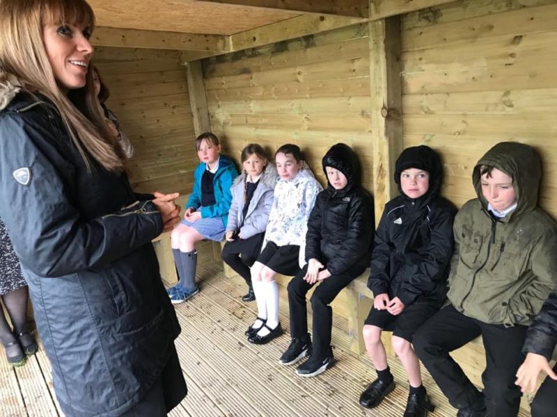 Angela with pupils in the outdoor classroom