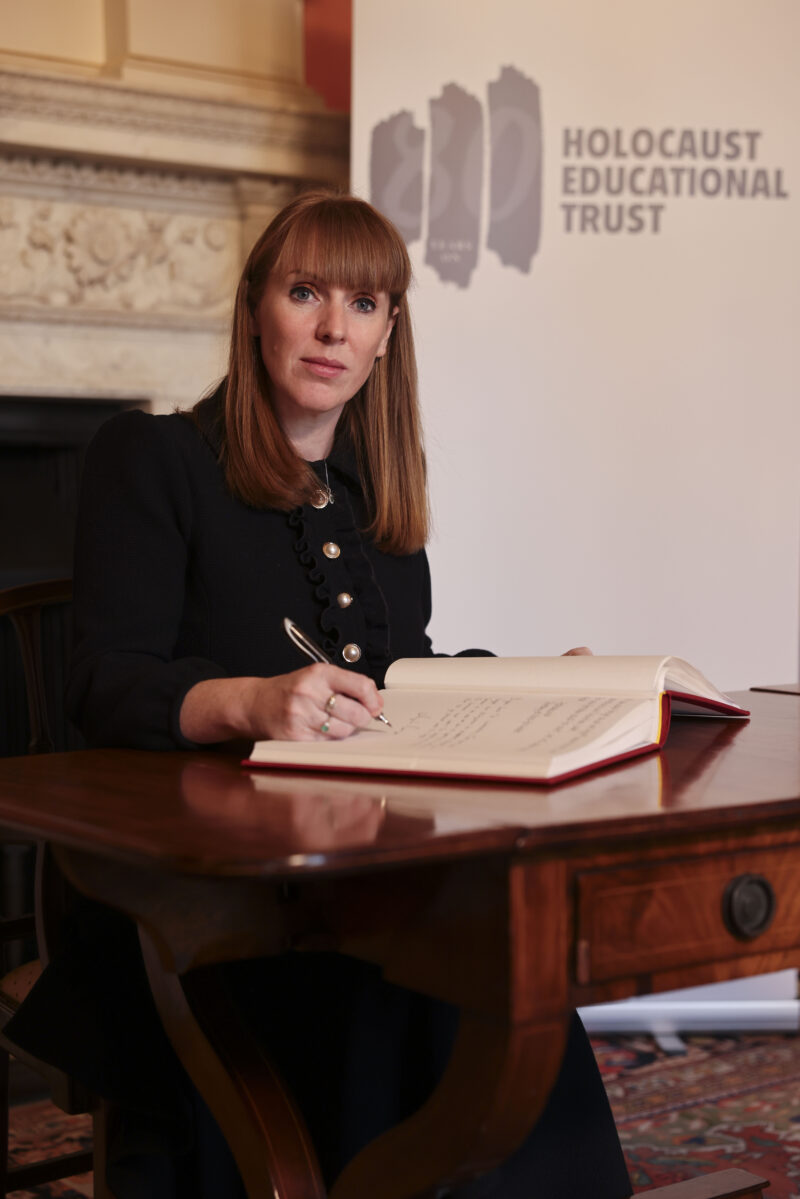 Signing the Book of Commitment