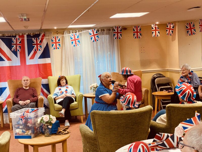 Residents enjoy the singer