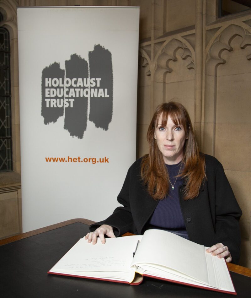 Signing the Book of Commitment